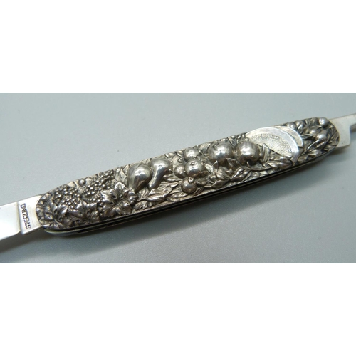 825 - An American sterling silver fruit knife, knife and pipper