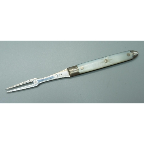 835 - An early 19th Century silver and mother of pearl olive fork