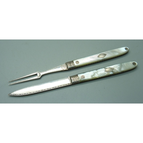 849 - A Georgian silver and mother of pearl fruit knife with matching olive fork, cased