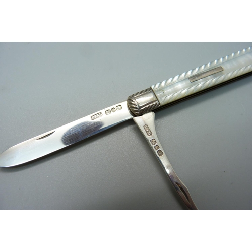 852 - A Victorian silver and mother of pearl fruit knife and pipper, Birmingham 1890, Hilliard & Thomason