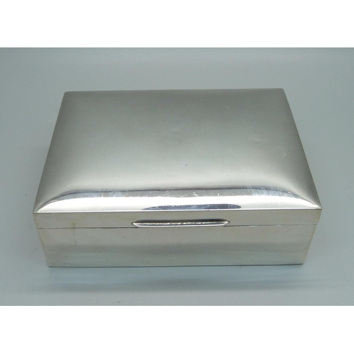 869 - A cedar lined silver cigarette box, 11.5cm wide