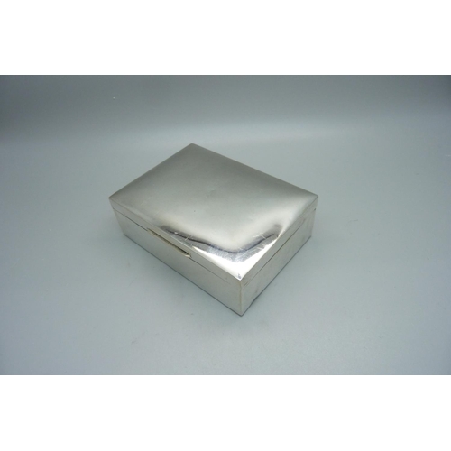 869 - A cedar lined silver cigarette box, 11.5cm wide