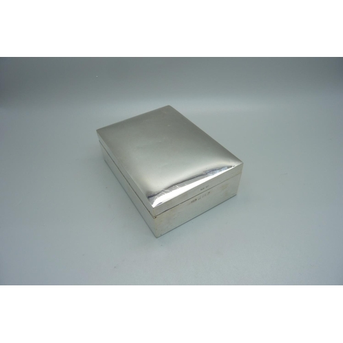 869 - A cedar lined silver cigarette box, 11.5cm wide