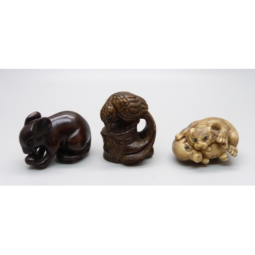 876 - Three carved netsuke, mouse, bird, and pig and tiger