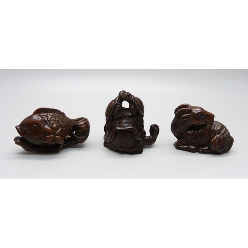 878 - Three carved netsuke, fish, deer and turtles