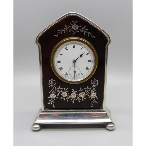 881 - A silver and tortoiseshell clock with key, Birmingham 1919