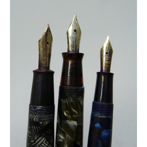 894 - Eight pens including four with 14ct gold nibs, Conway Stewart 58 and 12, Parker Vacumatic and one ot... 