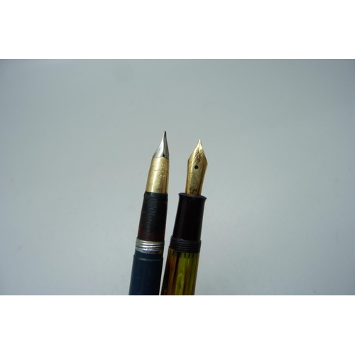 895 - A Pelikan pen with 14k gold nib and a Sheaffer fountain pen with 14k gold nib