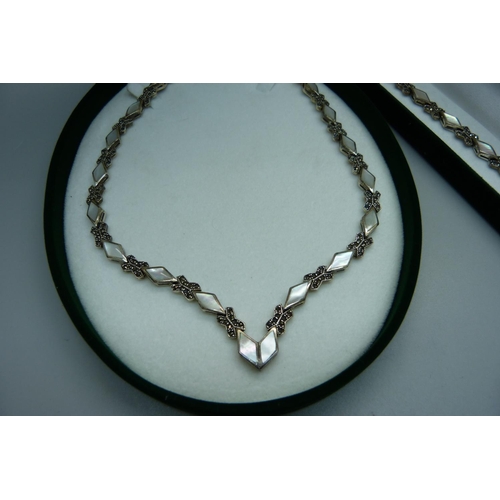 898 - A silver, mother of pearl and marcasite necklace and matching bracelet