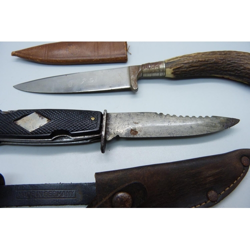 903 - A German scout knife, the blade marked Solingen, and a hunting knife