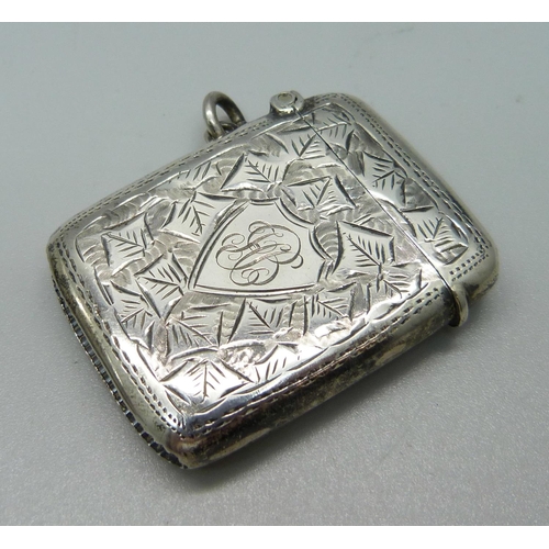 905 - A silver vesta case, Chester 1909 and a silver tobacco case, Birmingham 1921, 93g