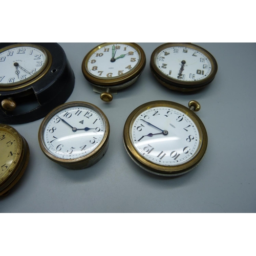 909 - Six 8-day travel clock movements and dials