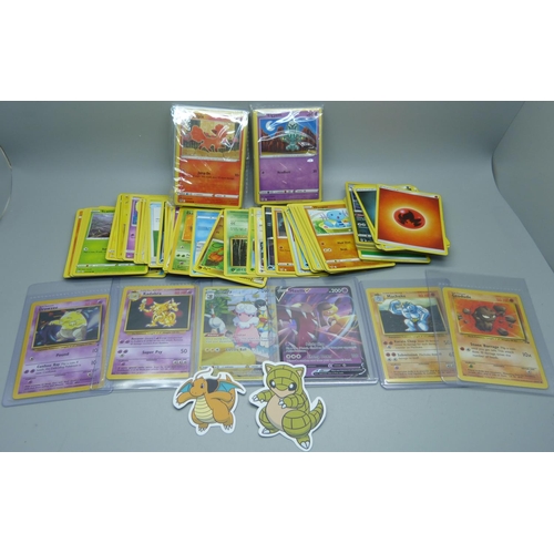 910 - A collection of Pokemon cards including base set, etc.