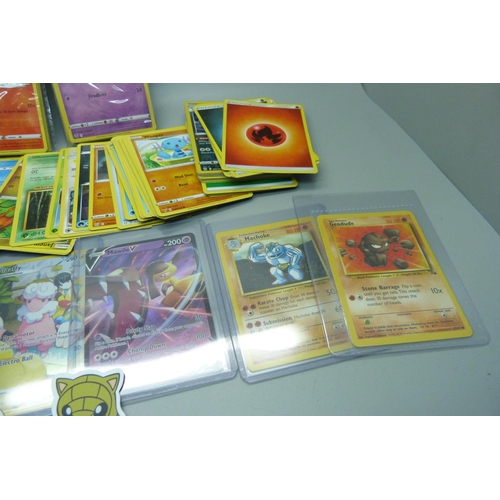 910 - A collection of Pokemon cards including base set, etc.