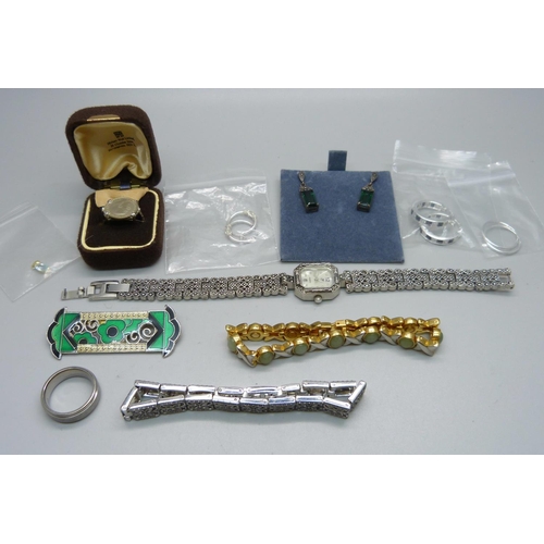 915 - A collection of rings, two bracelets, a wristwatch, a pair of earrings and a brooch