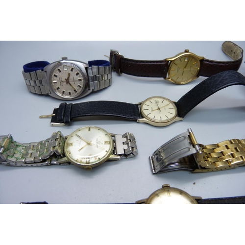 932 - A collection of gentleman's wristwatches