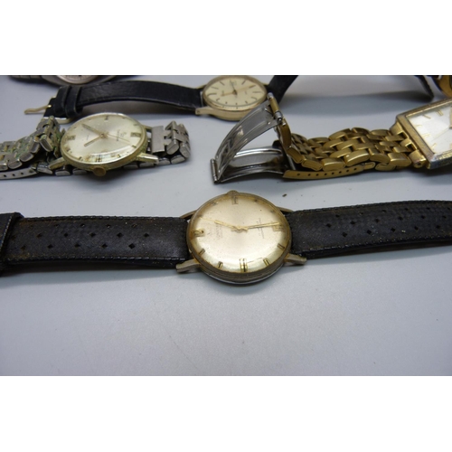 932 - A collection of gentleman's wristwatches