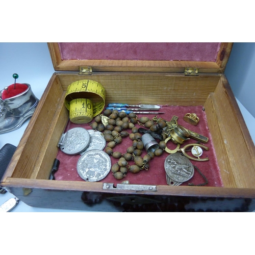 933 - Assorted items including a novelty shoe pin cushion, snuff box, vesta case, a folding brass ruler, c... 