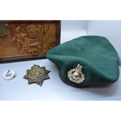 944 - A carved wooden box, a military beret with cap badge, other badges and a For Campaign Service medal ... 