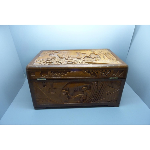 944 - A carved wooden box, a military beret with cap badge, other badges and a For Campaign Service medal ... 