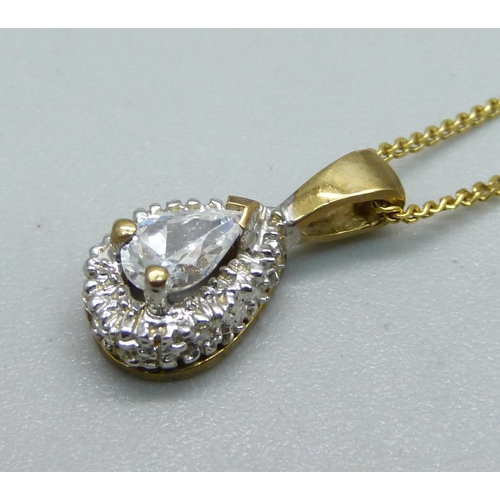 951 - A 9ct gold, white stone cluster pendant on a 9ct gold chain, 2.6g