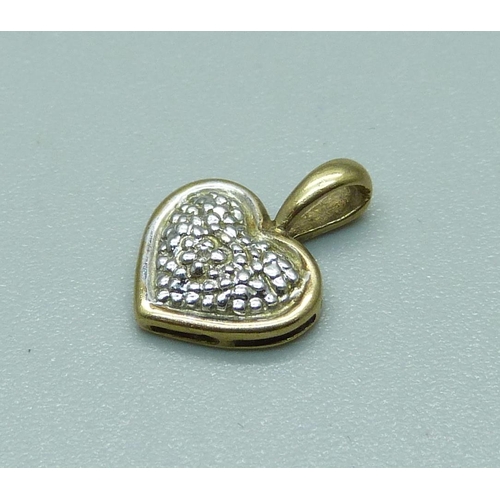 974 - A small 9ct gold and diamond heart shaped pendant, 0.9g