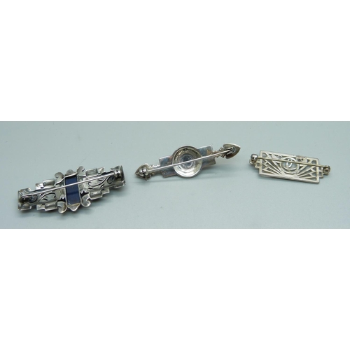 979 - Two silver brooches and one other brooch