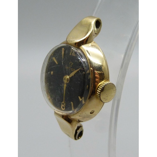 983 - A lady's 14ct gold Omega wristwatch head, weight of case with glass 6.2g