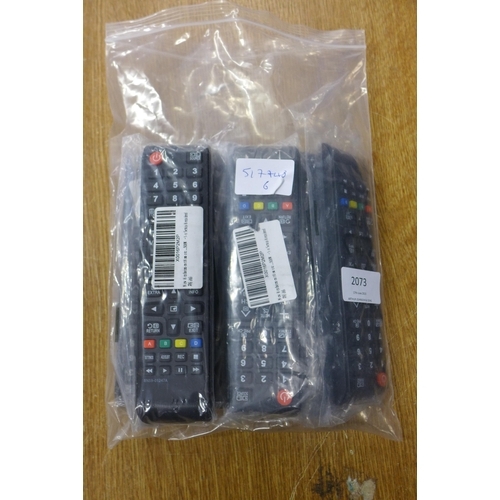 2073 - 6 Unused TV/video/stereo remote controllers