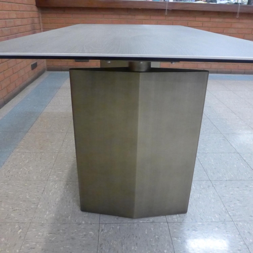 1301 - A grey ceramic topped dining table