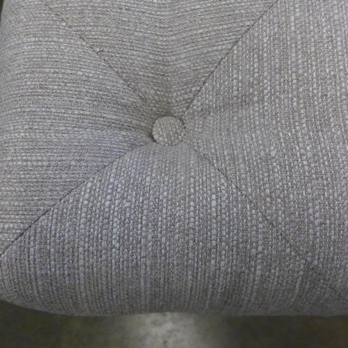 1323 - An oatmeal textured weave buttoned footstool