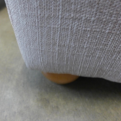 1323 - An oatmeal textured weave buttoned footstool