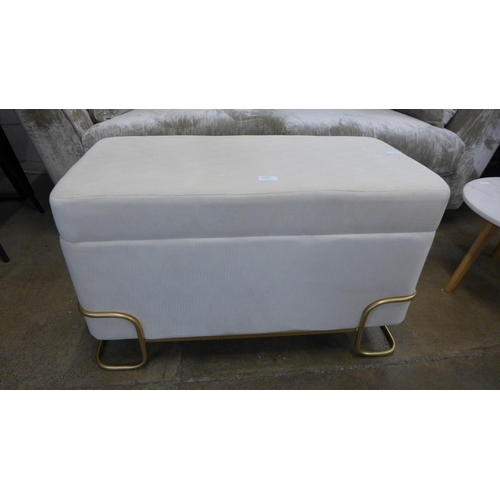 1333 - A cream upholstered blanket box