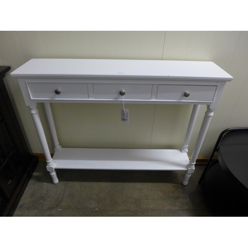 1335 - A three drawer white console table