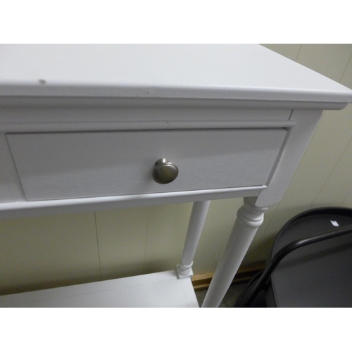 1335 - A three drawer white console table