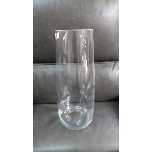 1398 - A tall clear glass lily vase