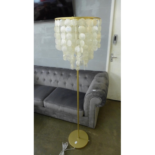 1407 - A floor standing lamp with shell design