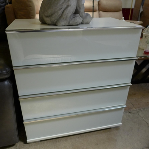 1408 - A white painted four drawer chest of drawers with metal handles, some marks* This lot is subject to ... 