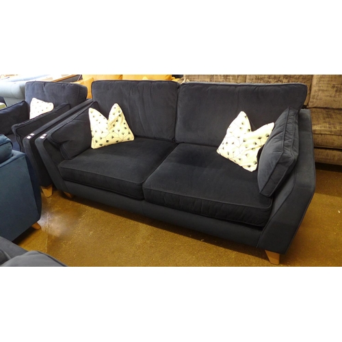 1430 - A Barker and Stonehouse deep blue velvet four seater sofa