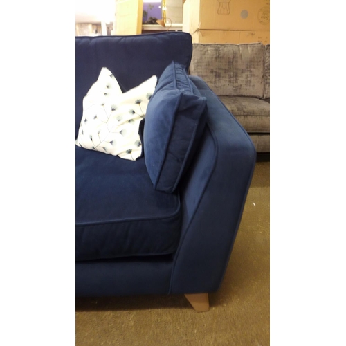 1430 - A Barker and Stonehouse deep blue velvet four seater sofa