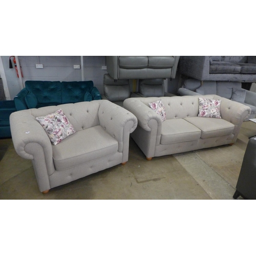 1442 - A taupe textured weave Chesterfield style three seater sofa and love seat with patterned scatter cus... 