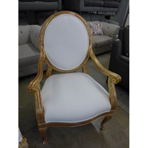 1443 - A pair of gold painted and white leather effect King and Queen chairs