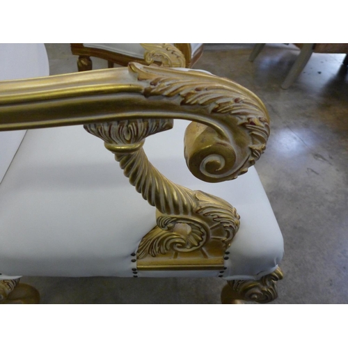 1443 - A pair of gold painted and white leather effect King and Queen chairs