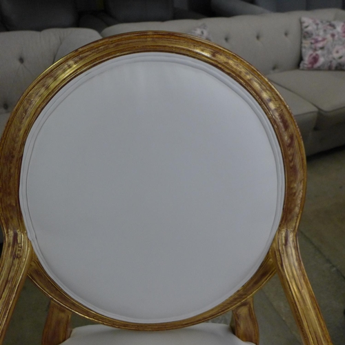 1443 - A pair of gold painted and white leather effect King and Queen chairs