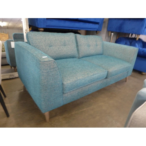 1468 - A prismarine blue upholstered 3.5 seater sofa