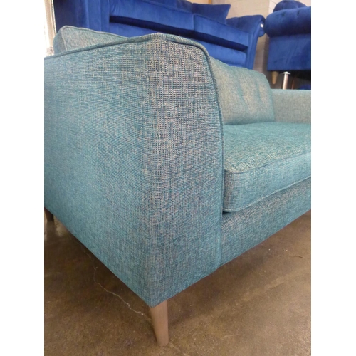 1468 - A prismarine blue upholstered 3.5 seater sofa