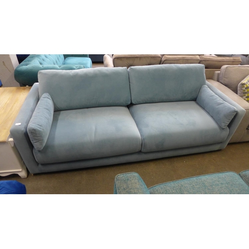 1471 - A light blue velvet upholstered four seater sofa