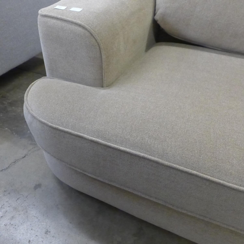 1505 - A sandstone upholstered RHF five seater corner sofa/chaise