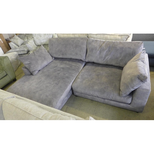 1579 - A grey sharkskin effect LHF four seater sofa/chaise