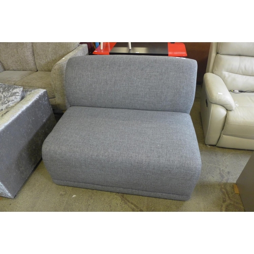 1590 - A grey textured two seater sofa without arms